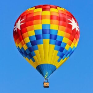 Colorful balloon floating freely in the sky, symbolizing lightness and release