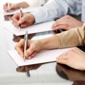 Student calmly studying with focus and confidence, symbolizing exam success through hypnosis.