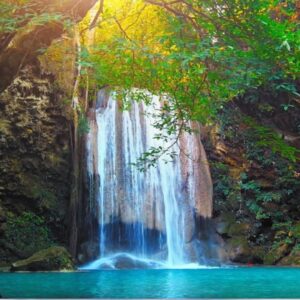 Gentle waterfall flowing calmly, symbolizing clarity, focus, and mental refreshment.
