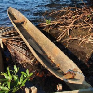 Boat on a calm sea bay, symbolizing the journey toward meeting your future self through hypnosis.
