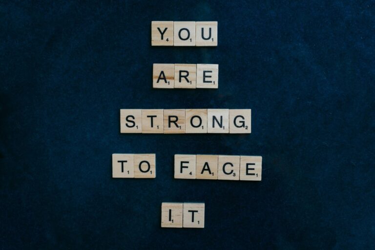 Motivational text image with the words “You are strong to face it” displayed in bold, uplifting style.