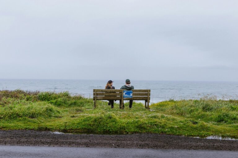 Two people sitting calmly in conversation, symbolizing tolerance and harmonious relationships