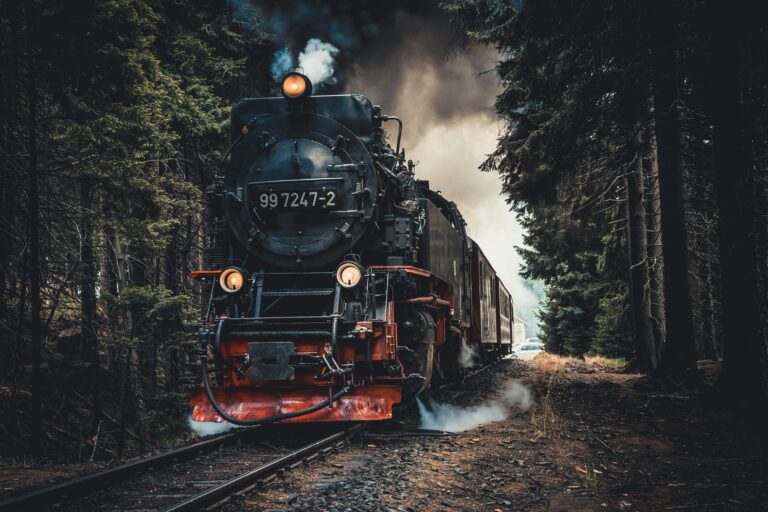 A cozy vintage train moving through a starlit night sky, glowing windows symbolizing calm passengers drifting into sleep.