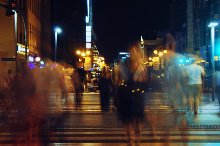 Busy city street with blurred motion, symbolizing fast-paced life, stress, and constant pressure
