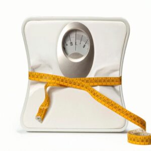 A weighing scale with a body measurement meter, symbolizing tracking, weight management, and health goals.