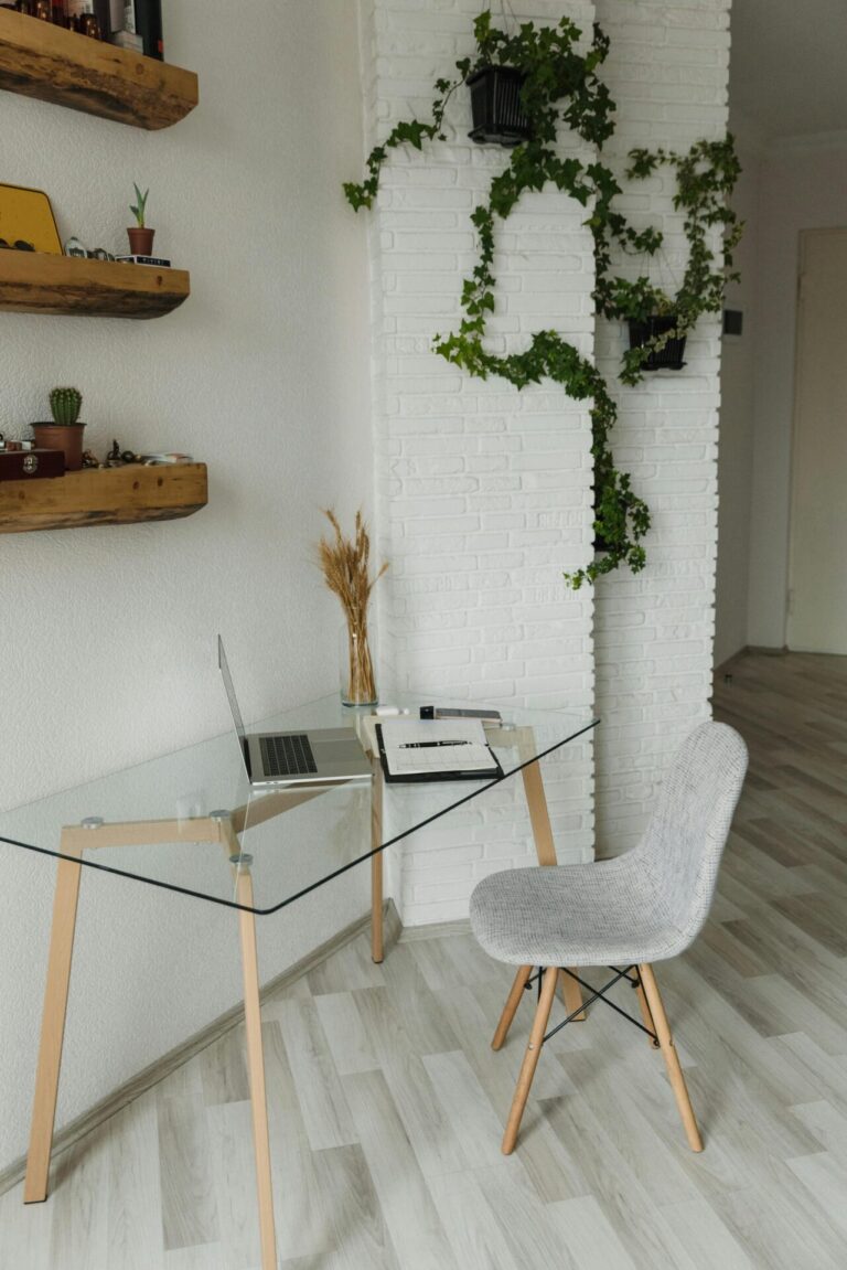 A peaceful workspace with tidy desk, soft lighting, and a calm atmosphere.
