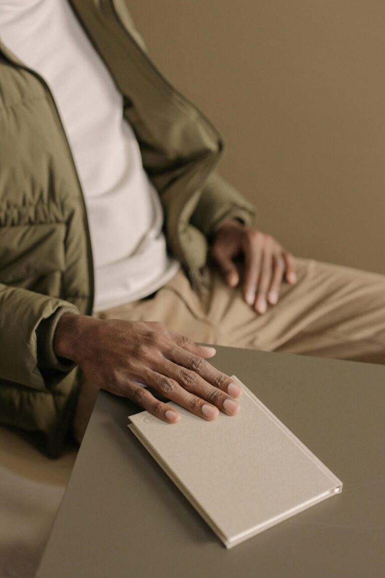 A person walking on a path with stepping stones labeled “Healthy Choices,” “Consistency,” and “Progress,” with a cigarette fading away in the background.