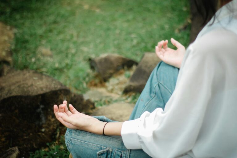 Woman meditating peacefully in a calm environment